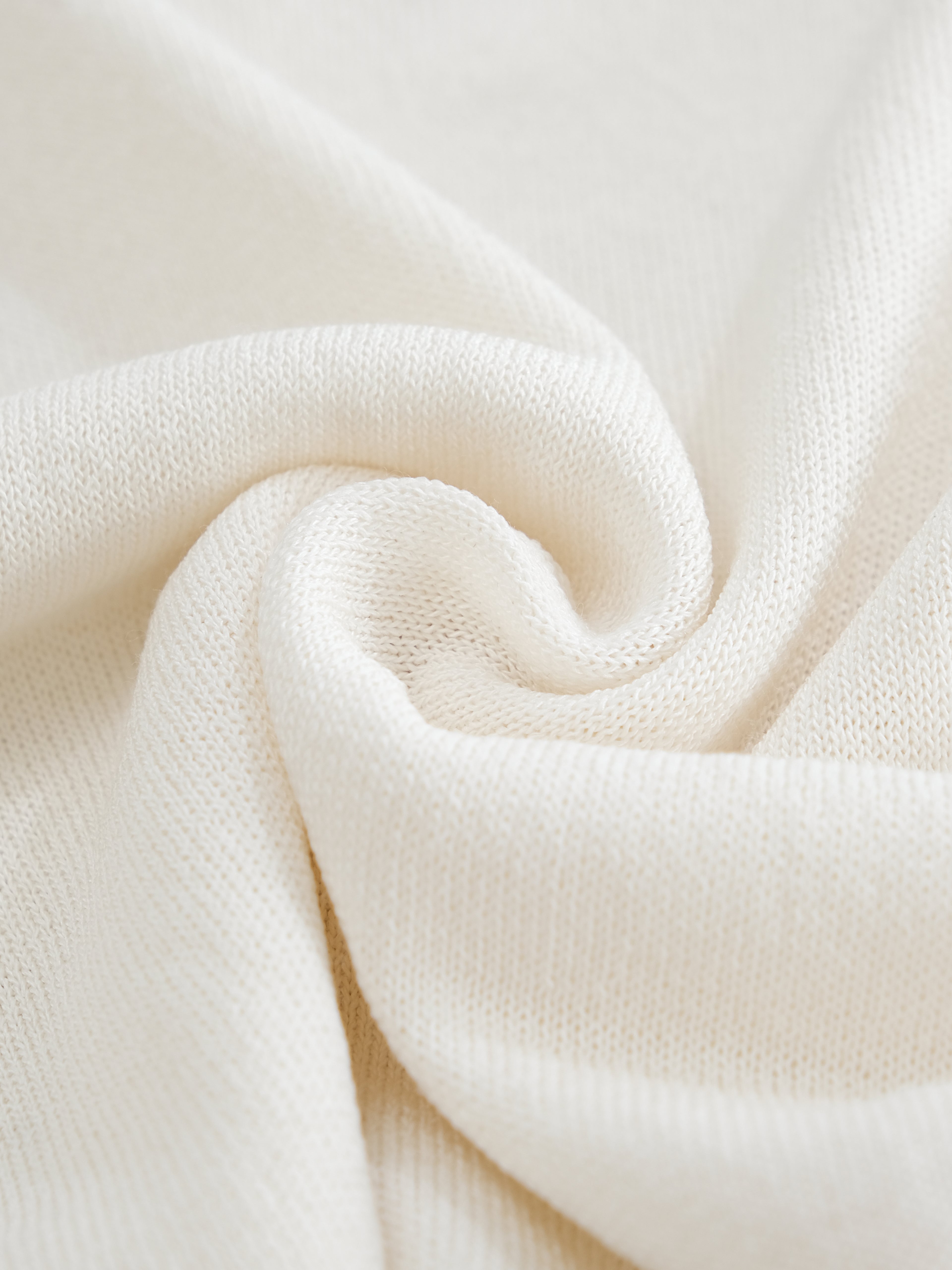Close-up of white fabric with soft texture